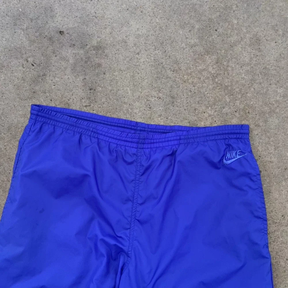 Vintage Y2K Era Nike Medium Royal Blue Nylon Windbreaker Track Pants 2007 Mens